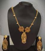 Golden Tone Floral Pendant And Matching Earring