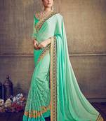 Sea green embroidered chiffon saree with blouse