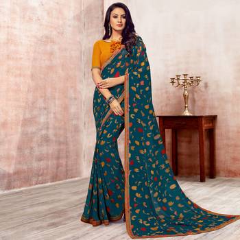Turquoise Printed Georgette saree with blouse 1