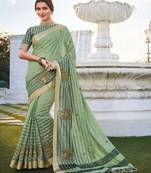   sea green embroidered cotton silk saree with blouse