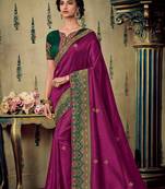 Rani pink embroidered satin saree with blouse