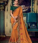 Orange embroidered satin saree with blouse