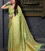 Light parrot green woven banarasi silk saree with blouse