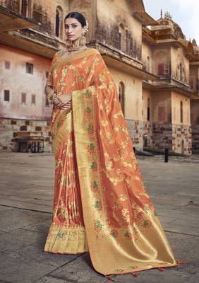 Orange woven silk saree with blouse 1