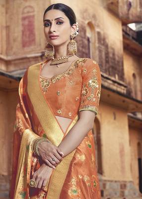 Orange woven silk saree with blouse 2