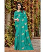 green  printed polyester saree with blouse