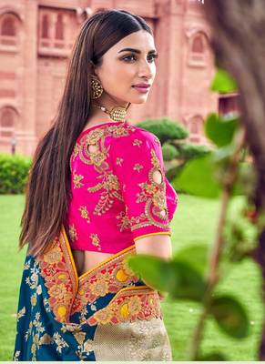 Teal embroidered silk saree with blouse 4