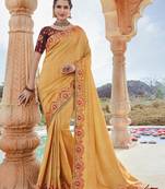 Light mustard embroidered silk saree with blouse
