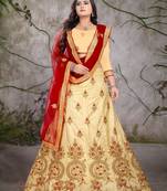 Beige embroidered silk semi stitched lehenga