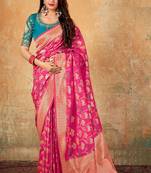 Pink woven banarasi silk saree with blouse