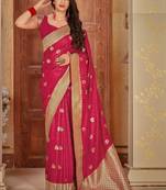 Pink woven banarasi silk saree with blouse