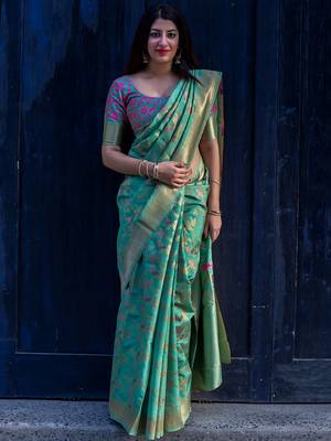 Turquoise woven banarasi silk saree with blouse 1