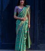 Turquoise woven banarasi silk saree with blouse