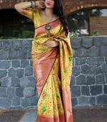 Light yellow woven banarasi silk saree with blouse