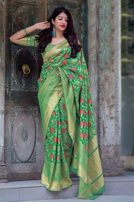 Green woven pure silk saree with blouse 1