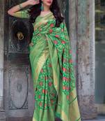 Green woven pure silk saree with blouse
