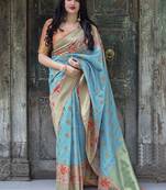 Sky blue woven pure silk saree with blouse