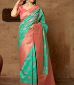 Turquoise woven banarasi silk saree with blouse
