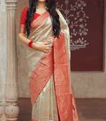 Cream woven banarasi silk saree with blouse