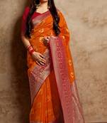 Orange woven banarasi silk saree with blouse