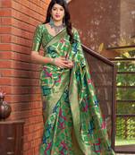 Green woven banarasi silk saree with blouse