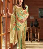 Cream woven banarasi silk saree with blouse