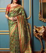 Green woven banarasi silk saree with blouse