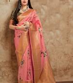 Pink woven banarasi silk saree with blouse