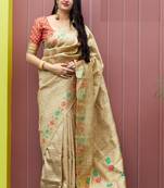 Cream woven banarasi silk saree with blouse