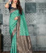 Turquoise woven banarasi silk saree with blouse