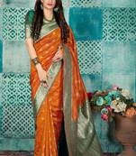 Orange woven banarasi silk saree with blouse