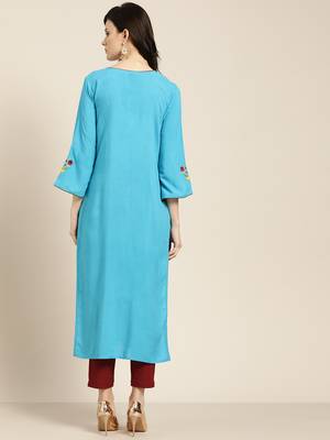 Women's Blue Placement Embroidered straight kurta with solid pant 3