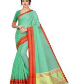Green plain cotton silk saree with blouse