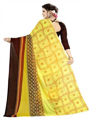 Yellow printed georgette saree with blouse 3