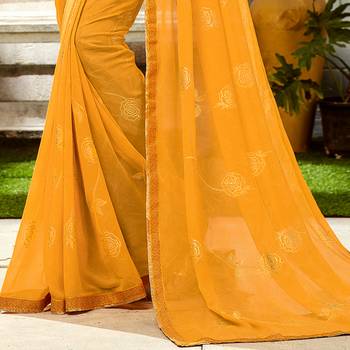 Yellow printed Georgette saree with blouse 3