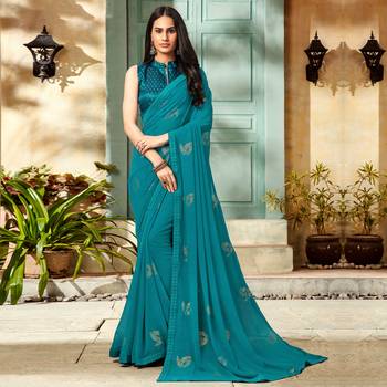 Turquoise woven Georgette saree with blouse 1