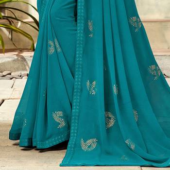 Turquoise woven Georgette saree with blouse 3