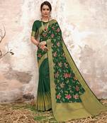 Green woven Silk blend saree with blouse