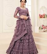 Purple embroidered net semi stitched lehenga