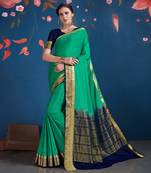 Green woven Silk blend saree with blouse