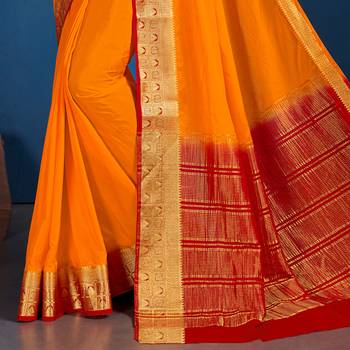 Orange woven Silk blend saree with blouse 3