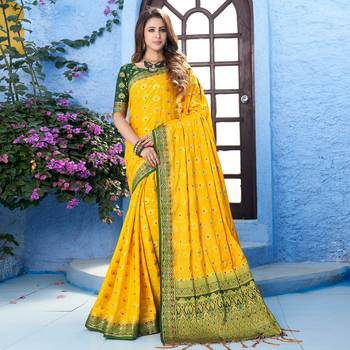 Yellow  woven Silk blend saree with blouse 1