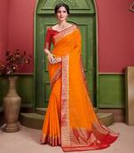 Orange woven Silk blend saree with blouse