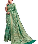 Green woven silk saree with blouse