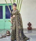 Black woven art silk saree with blouse
