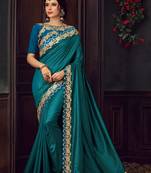 Teal embroidered poly silk saree with blouse