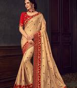 Gold embroidered poly silk saree with blouse