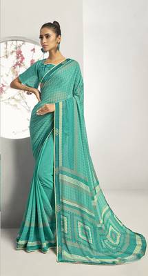 Green woven georgette saree with blouse 1