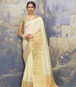 Cream woven art silk saree with blouse