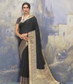 Black woven art silk saree with blouse